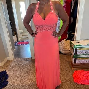 Beautiful coral colored dress.